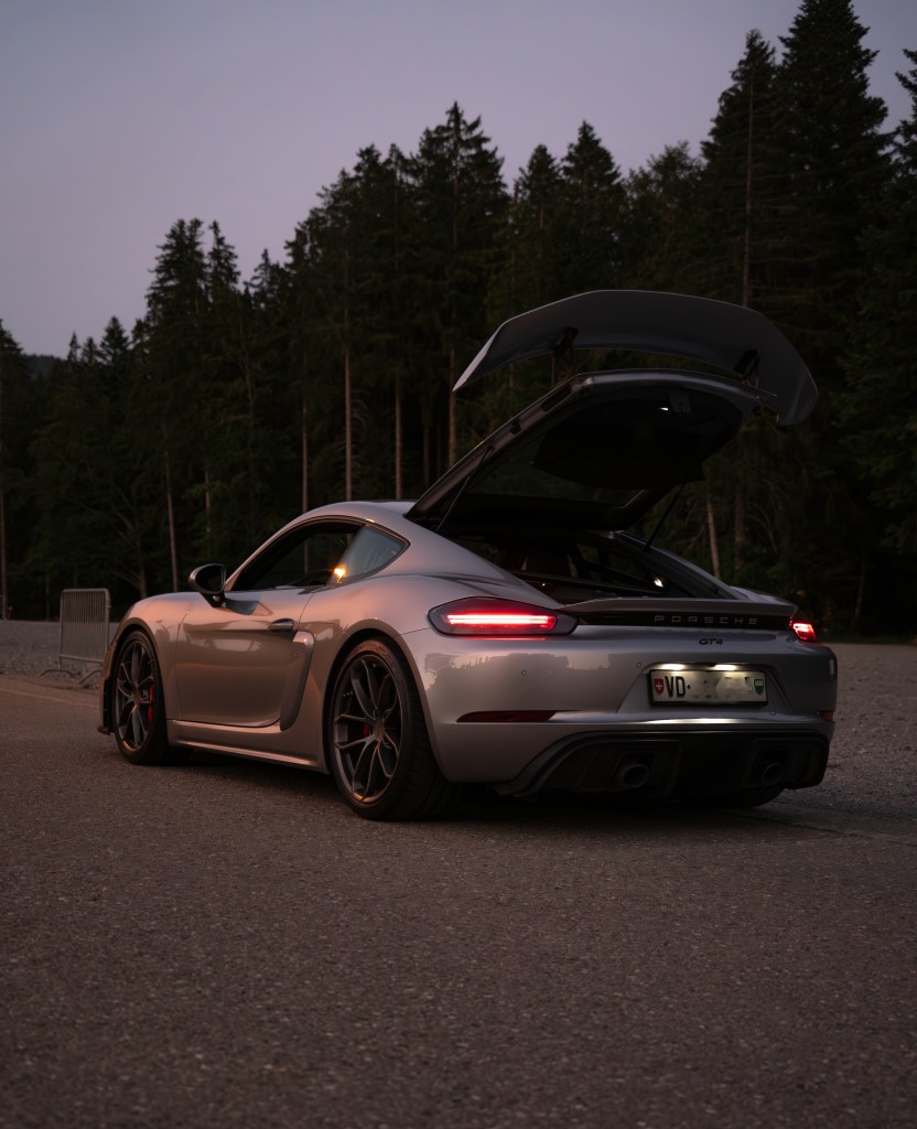 Porsche boxter with open trunk